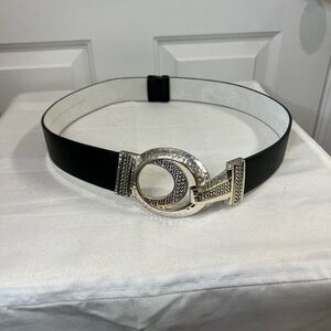 Chico’s black leather adjustable length belt with diver and gold tone buckle